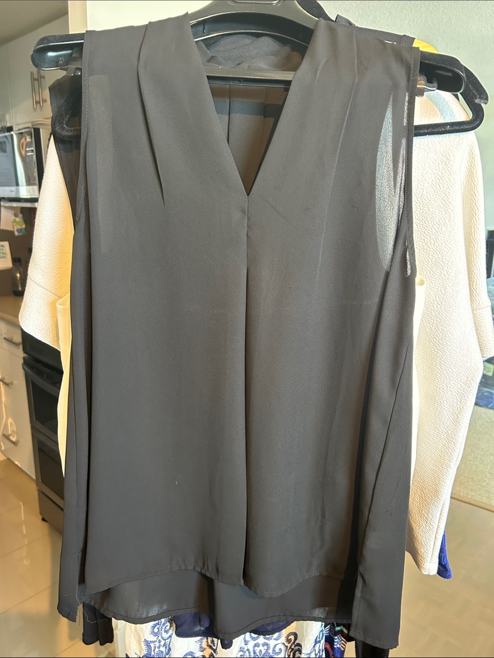 Classic Black V-Neck Sleeveless sheer Blouse.front back pleat. Classic style